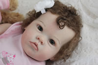 Awake reborn baby close up